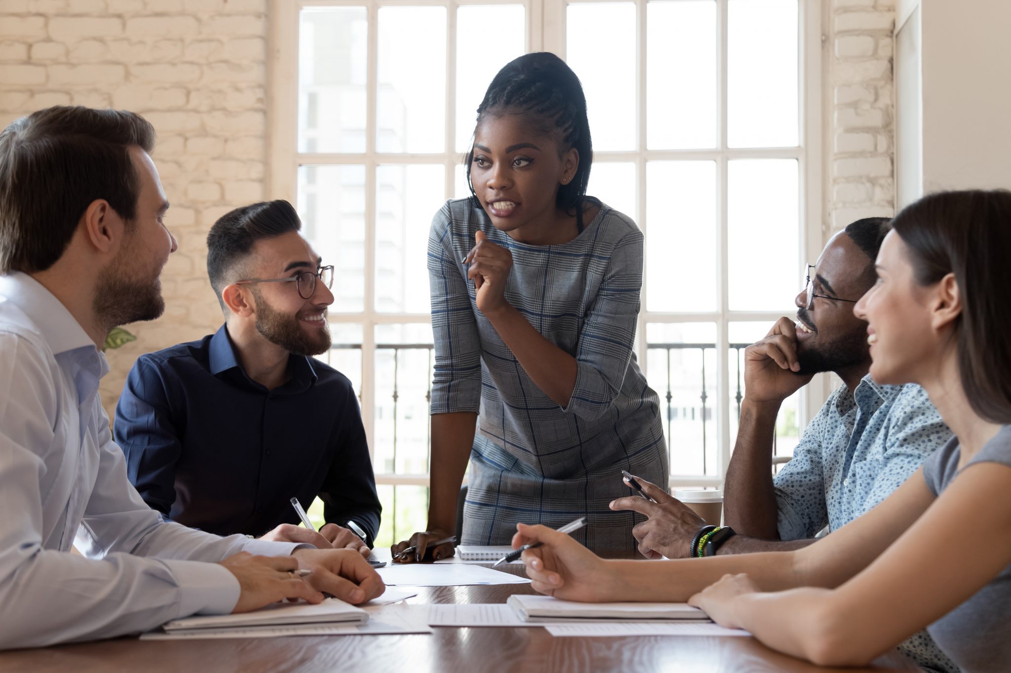 Black_Woman_Leading_Meeting-2048x1365 Black_Woman_Leading_Meeting-2048x1365